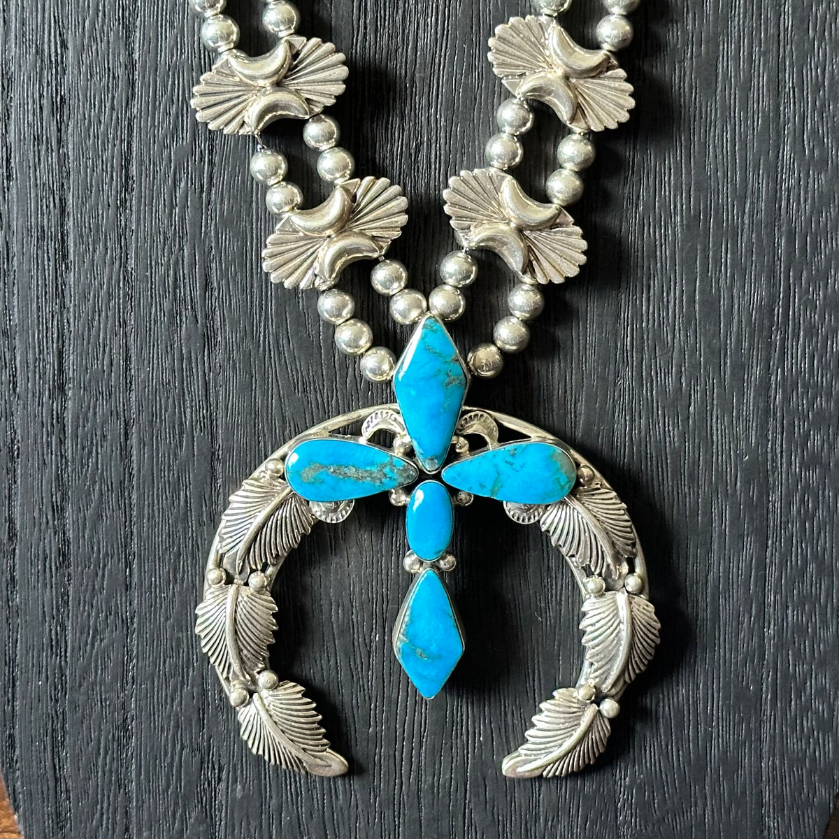 Running Bear Trading 5 Stone Sterling Cross Leaf Raindrop Naja Necklace