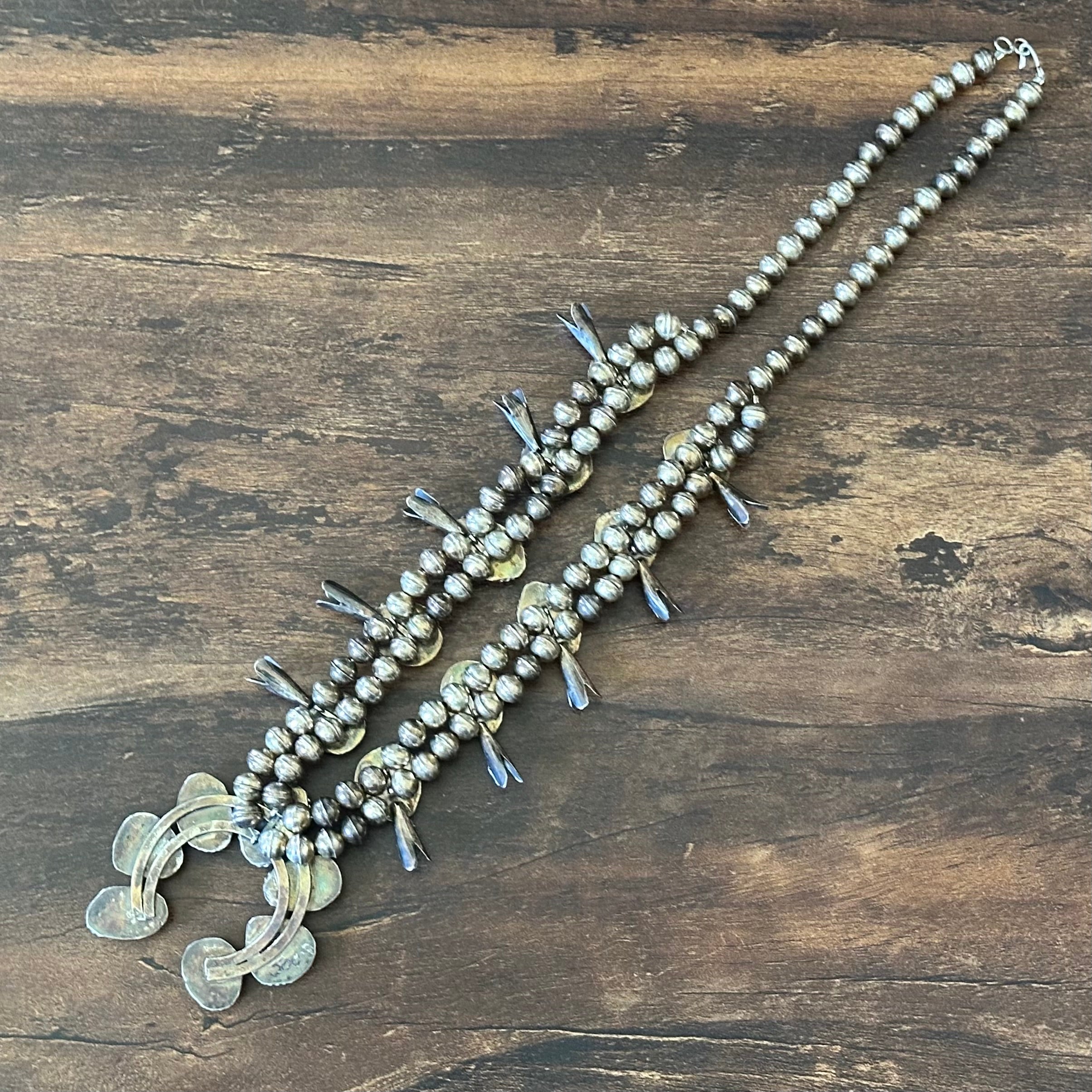1970-80s Turquoise 17 Stone Sterling Twist Wire Bezel Squash Blossom