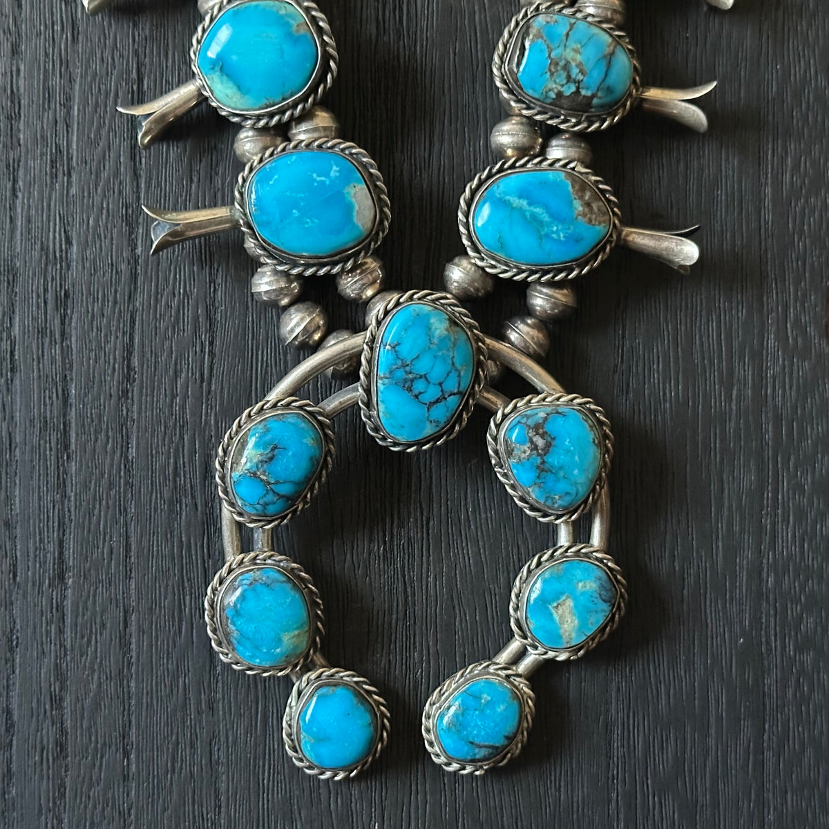 Vintage Turquoise 17 Stone Sterling Twist Wire Bezel Squash Blossom