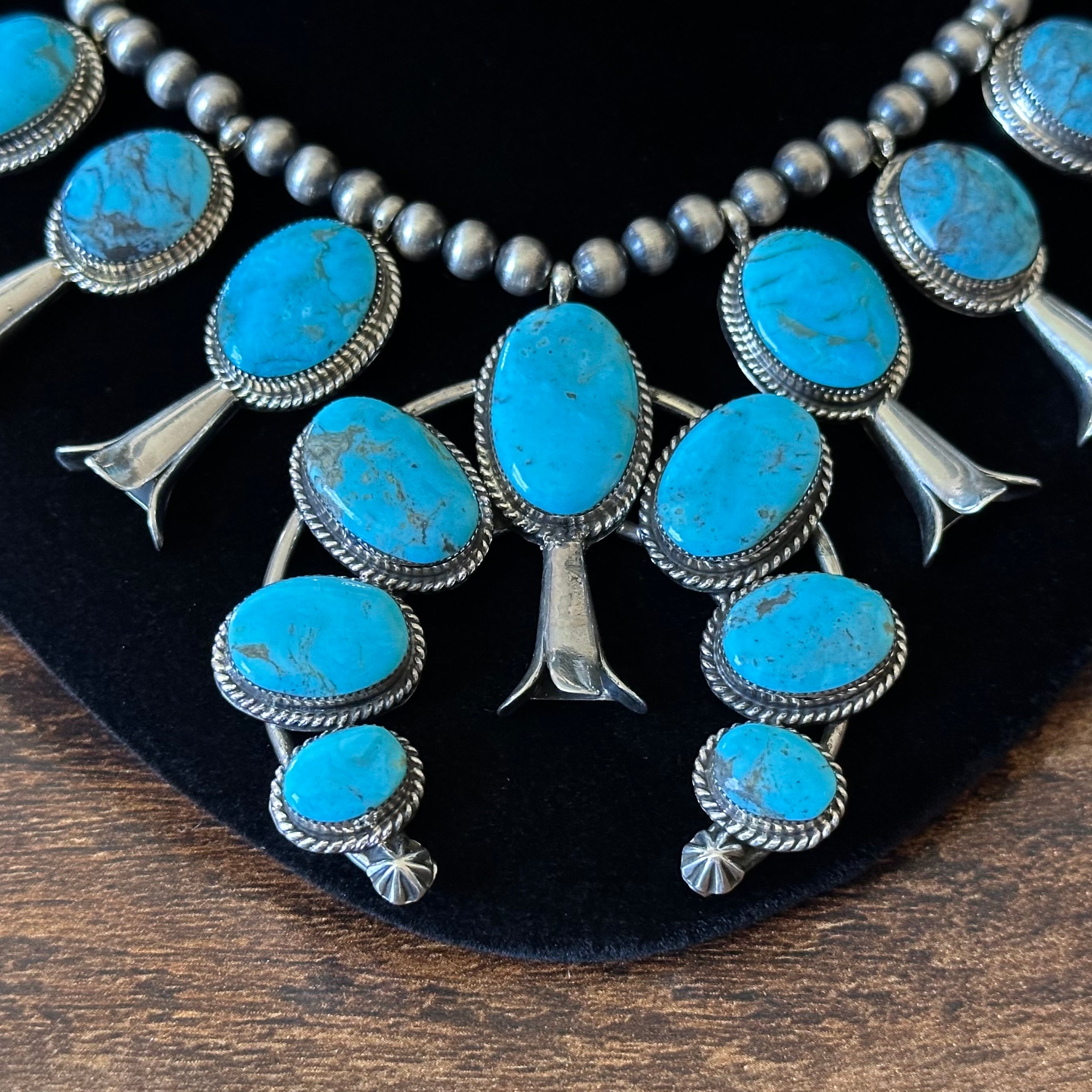 Running Bear Trading Turquoise 17 Stone Sterling Twist Wire Squash Blossom