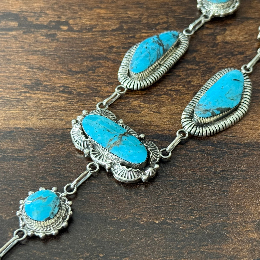 Running Bear Trading Turquoise 10 Stone Sterling Hand Stamped Twist Wire Bezel Lariat