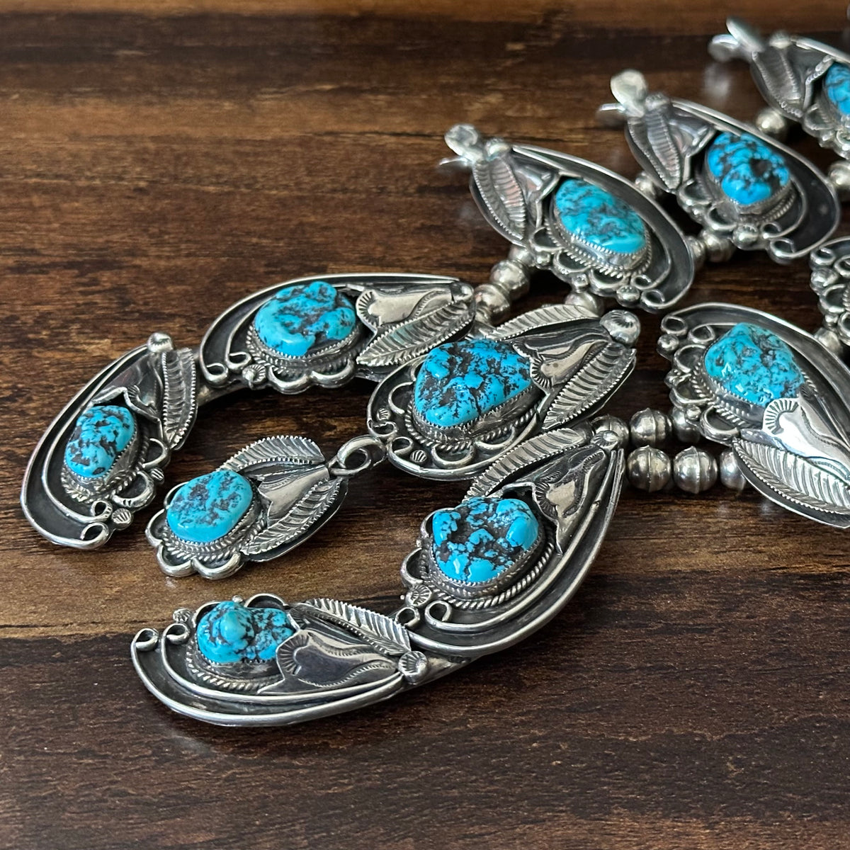 1970s GH Signed Turquoise 18 Nugget Stone Sterling Hand Stamped Ornate Squash Blossom Necklace Earrings Set