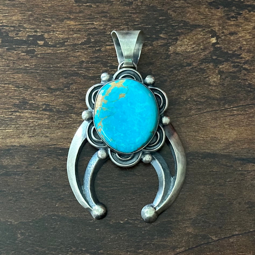 Chimney Butte Turquoise Sterling Floral Raindrop Naja Pendant