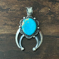 Chimney Butte Turquoise Sterling Floral Raindrop Naja Pendant