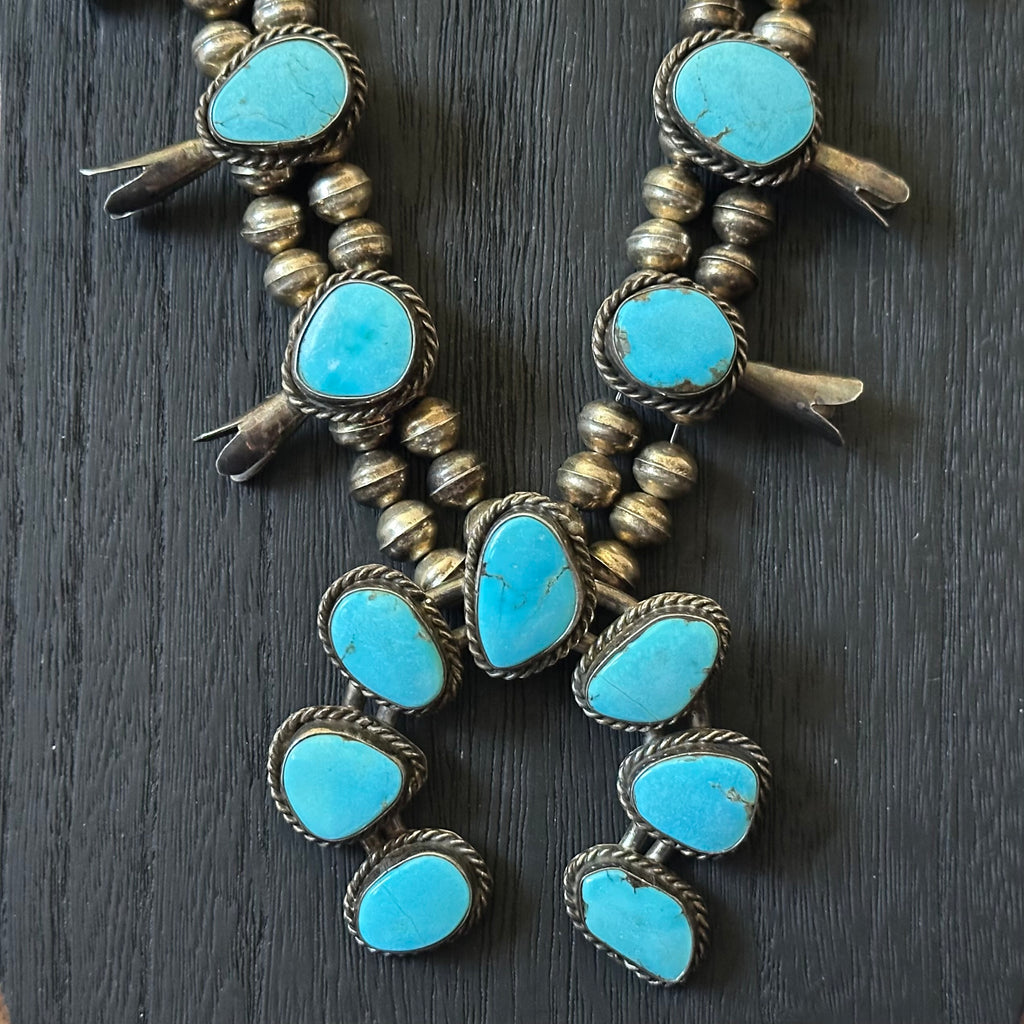 1970-80s Turquoise 17 Stone Sterling Twist Wire Bezel Squash Blossom
