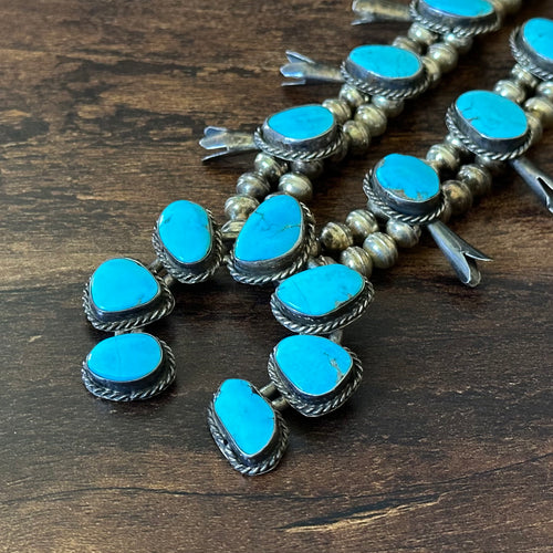 1970-80s Turquoise 17 Stone Sterling Twist Wire Bezel Squash Blossom