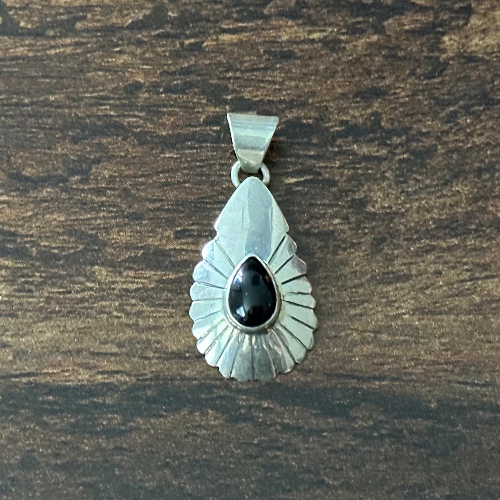 N.W. Signed Onyx Sterling Concho Teardrop Pendant